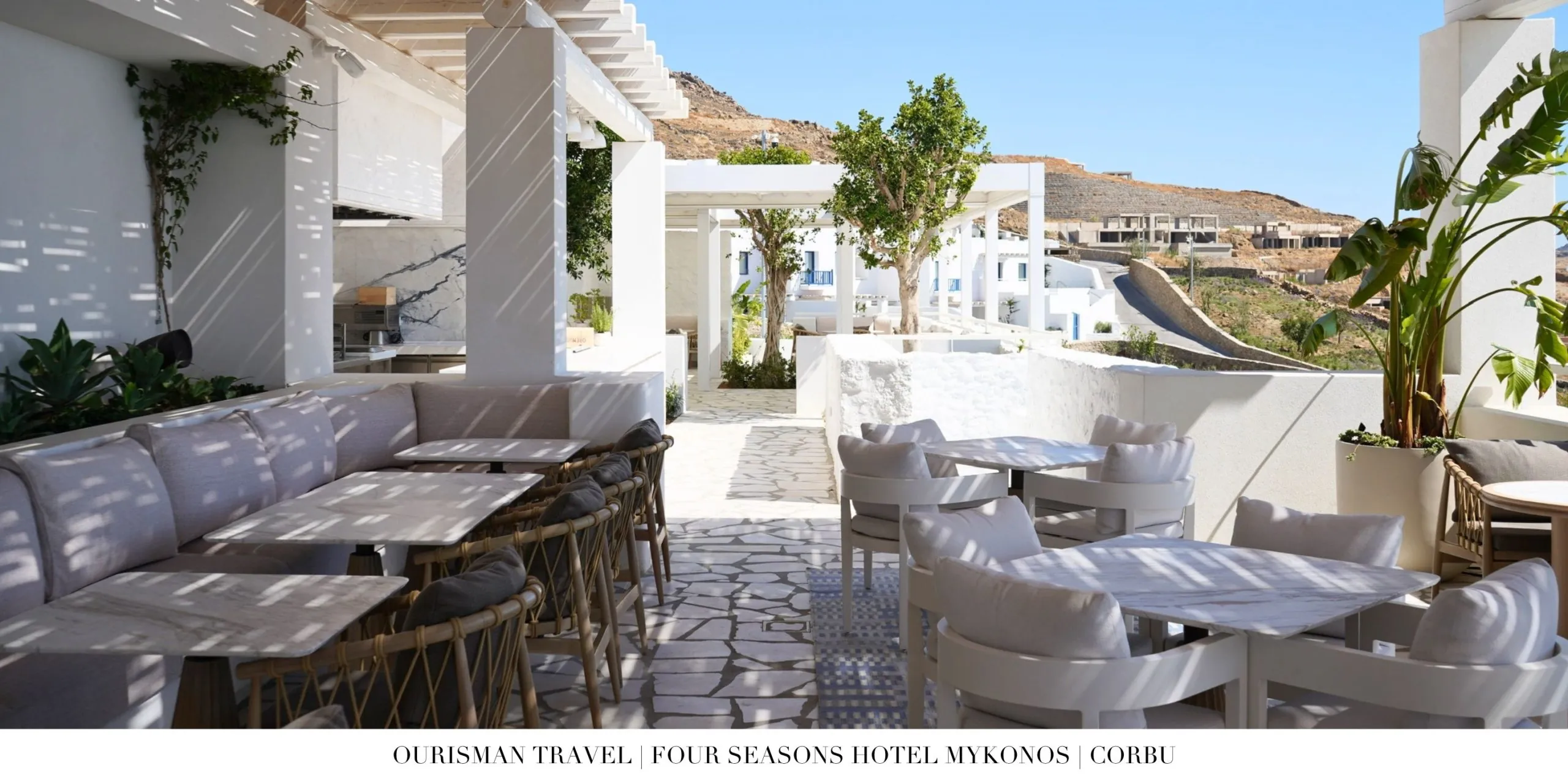 Outdoor terrace at Corbu restaurant at Four Seasons Mykonos